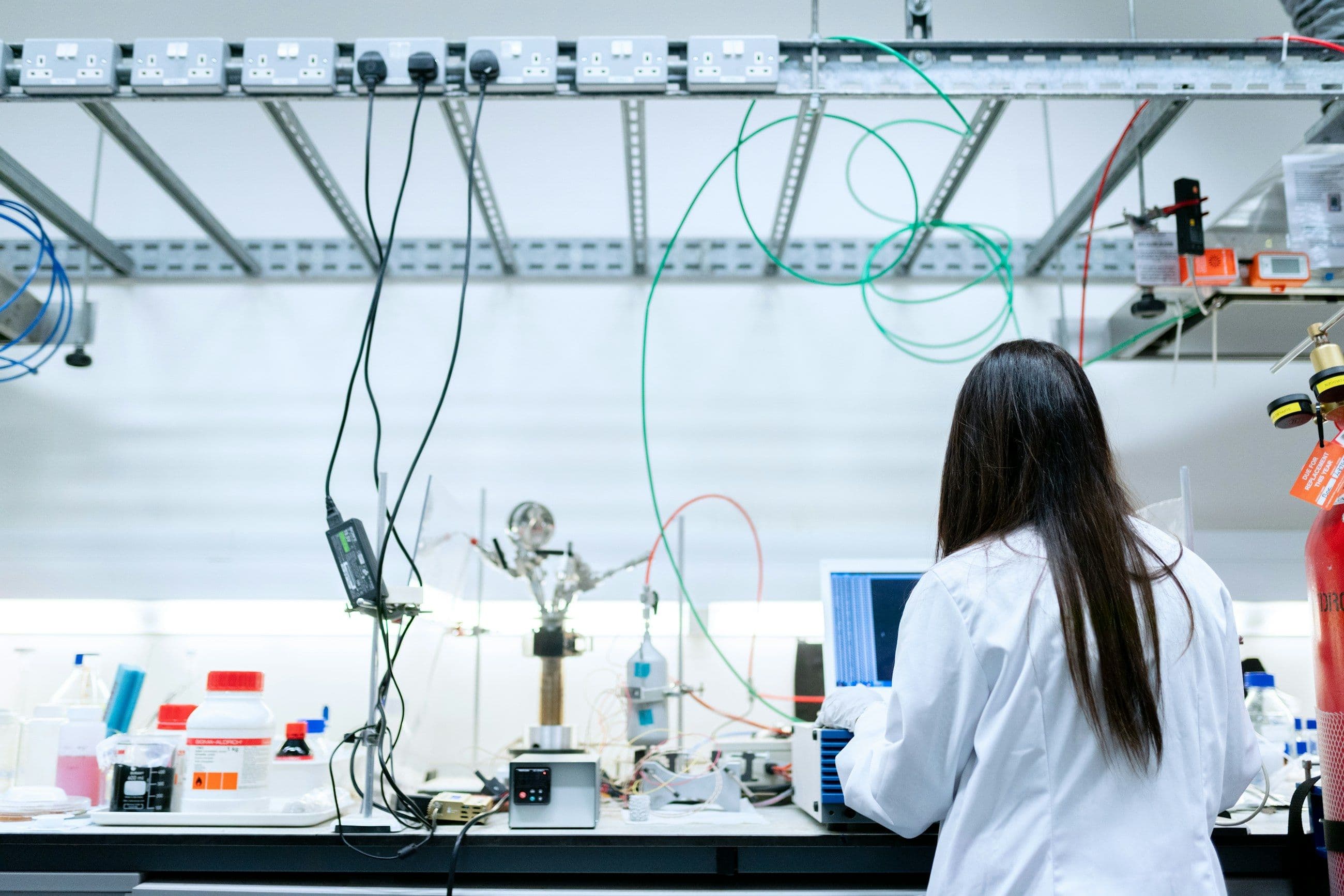 Chemist at work in a bright formulation laboratory