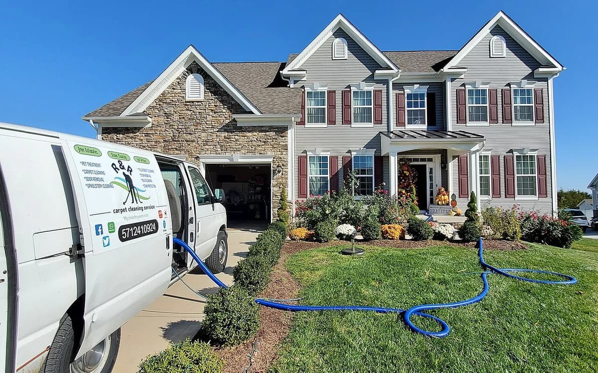 Commercial carpet cleaning and floor extraction machine operating indoors