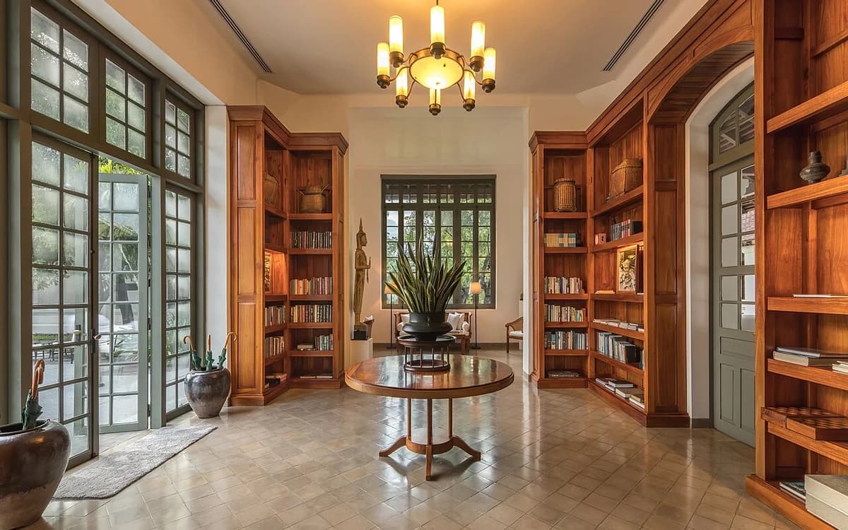 Luxury resort library and lounge interior with closed glass windows