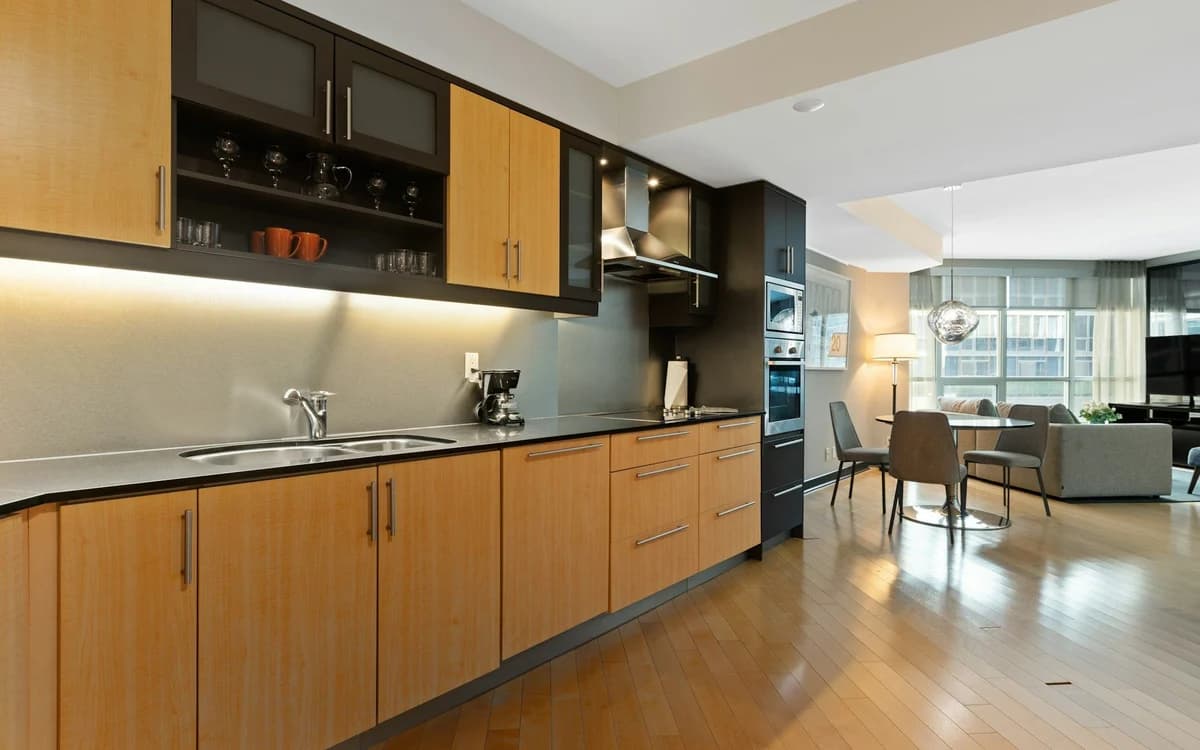 Custom built-in wooden wardrobe cabinetry with internal shelves and drawer boxes