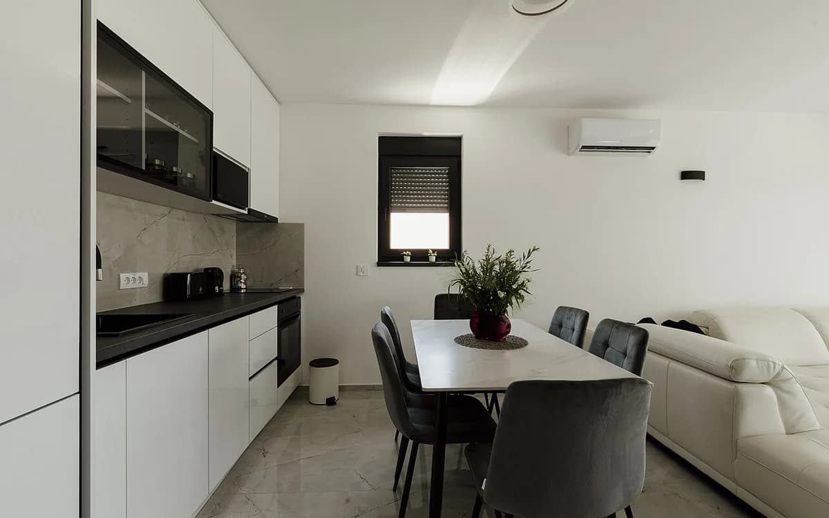 Modern kitchen cabinetry and countertop installation in a residential interior