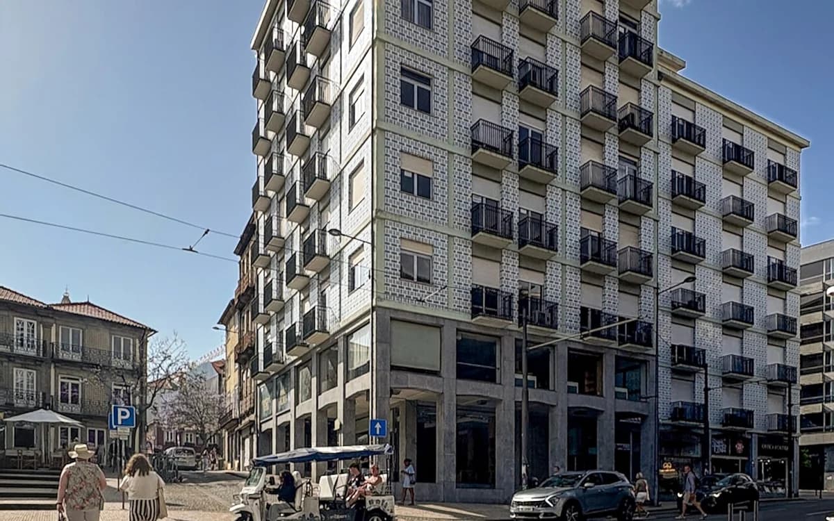 Multi-family residential apartment building exterior with balconies