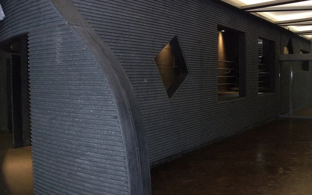 Raw poured structural concrete interior wall in a commercial building