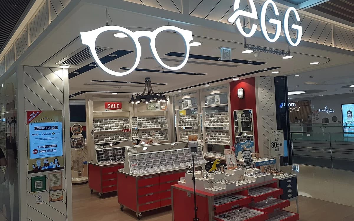Shopping mall luxury boutique storefront and illuminated display counters