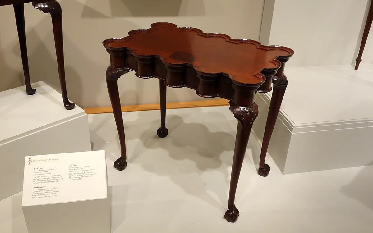 Polished solid mahogany wooden tea table showing rich natural timber grain