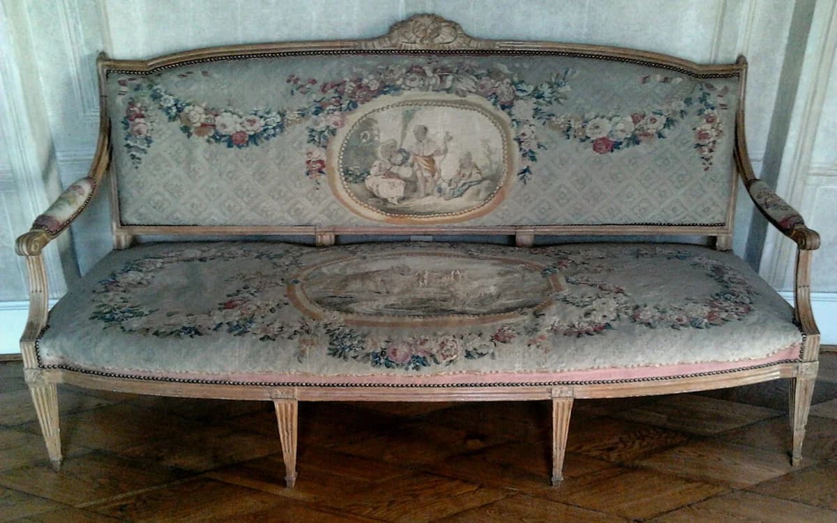 Upholstered fabric sofa in a commercial lounge requiring Stage 1 thermal formaldehyde extraction