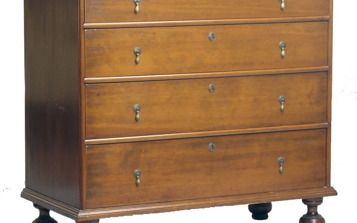 Open wooden chest of drawers showing untreated raw MDF drawer bottoms and back panel